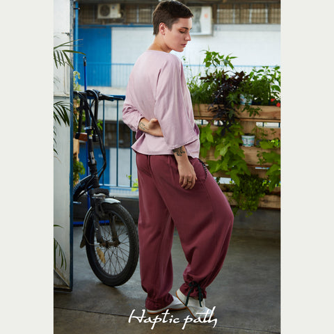 Wide trousers with flexible belt